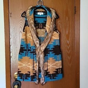 Tasha Polizzi vest